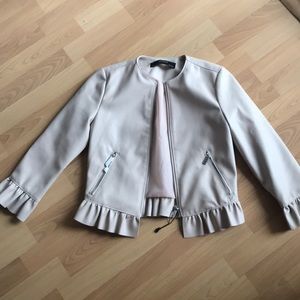 Blush faux leather jacket with ruffles - Zara.